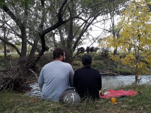 two people by a lake at estancia in argentina